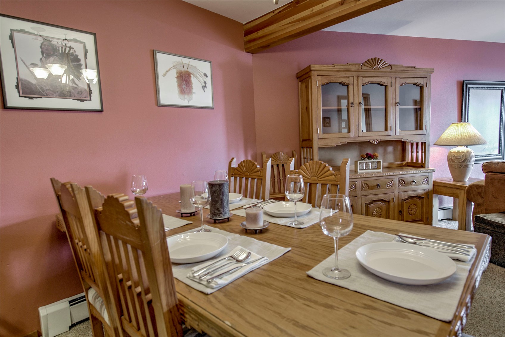 94300 Ryan Gulch Road, Unit 301 Silverthorne, CO 80498 - Photo 6 of 35 a living room with furniture and wooden floor