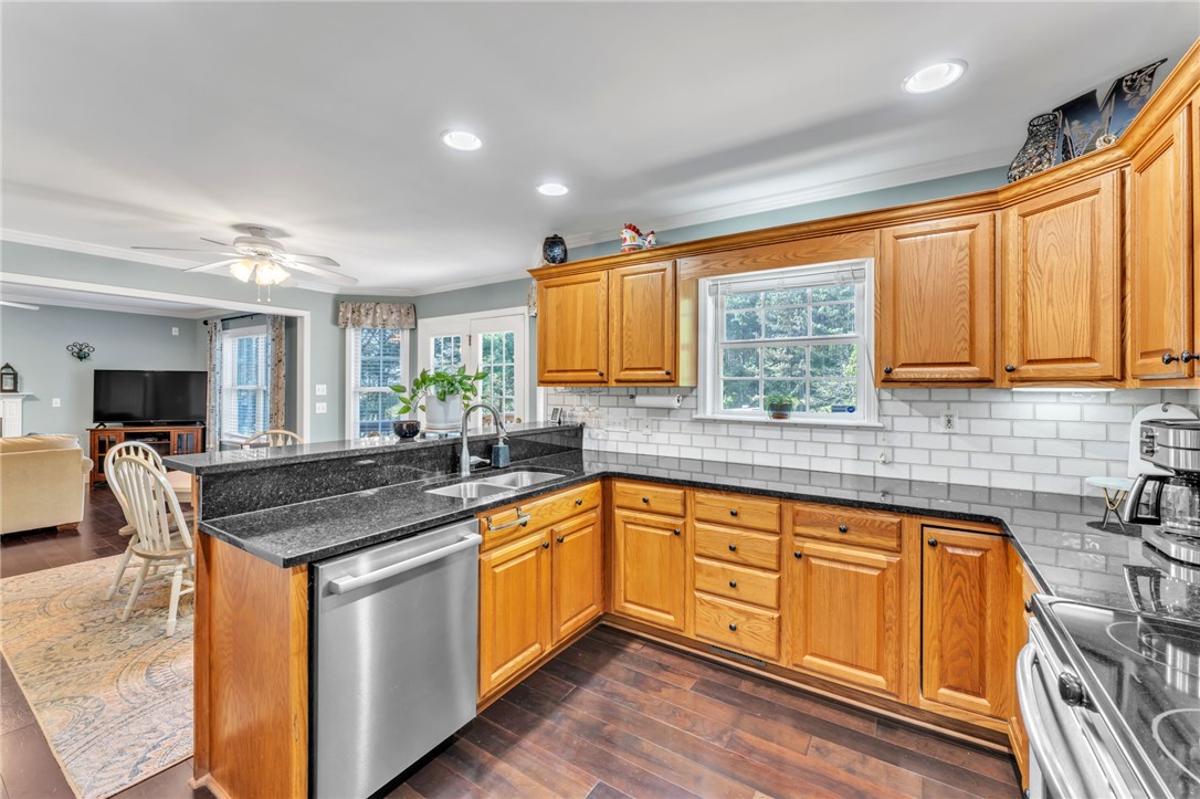 154 Hammond School Road Anderson, SC 29621 - Photo 8 of 33 This functional kitchen features ample cabinetry and a practical layout for daily living.