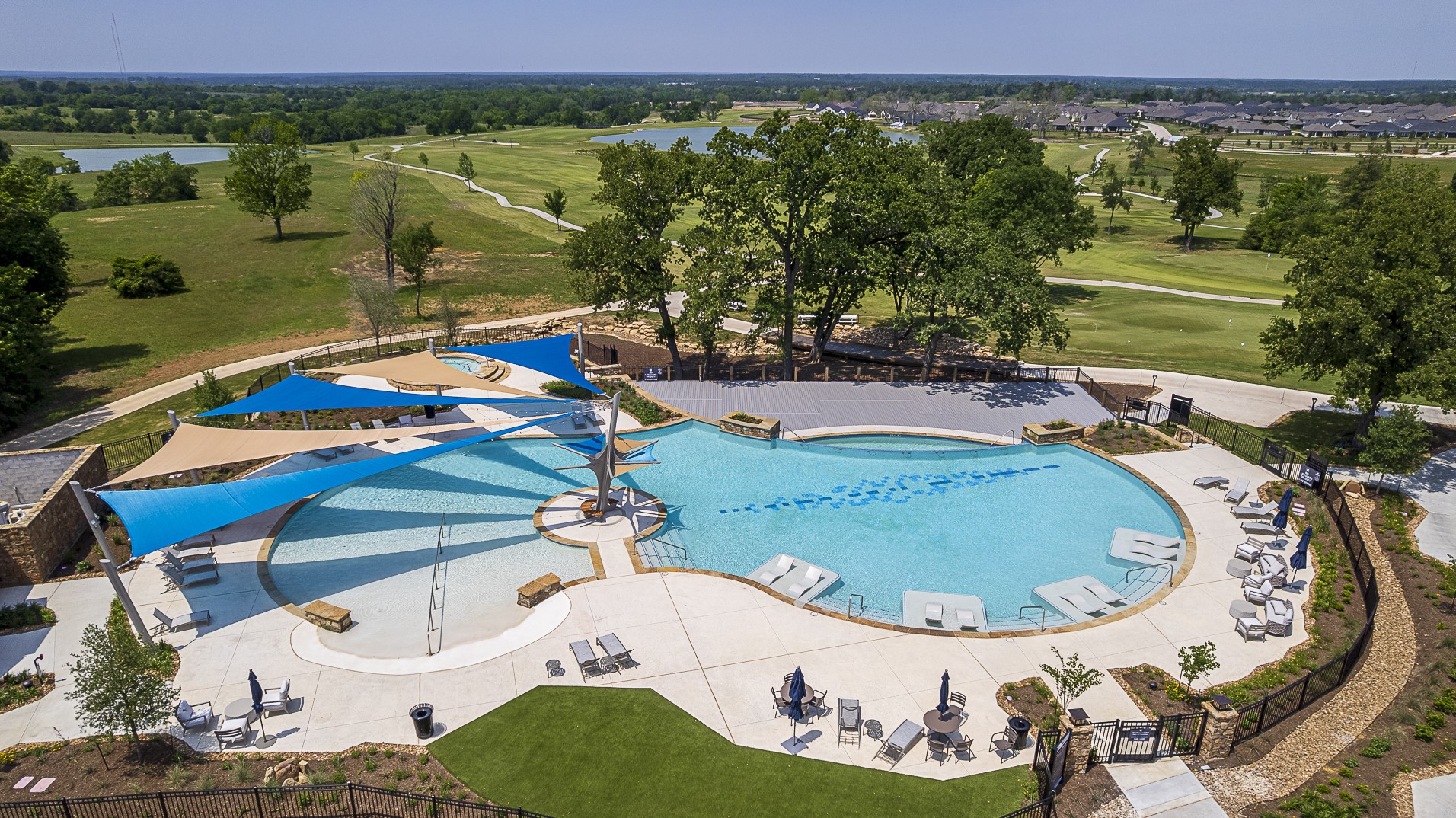 10026 Larkin Cove Willis, TX 77318 - Photo 42 of 46 an aerial view of a house with outdoor space swimming pool and outdoor seating