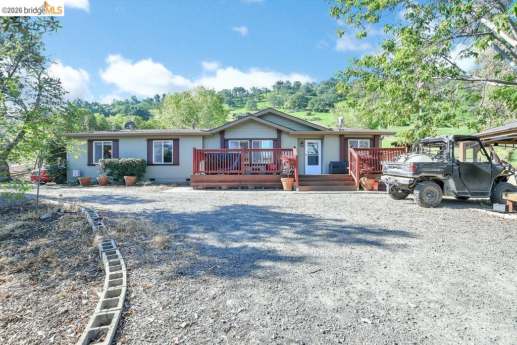 Single story home featuring a deck and crawl space