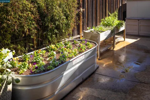a spacious bedroom with a bed and a large window