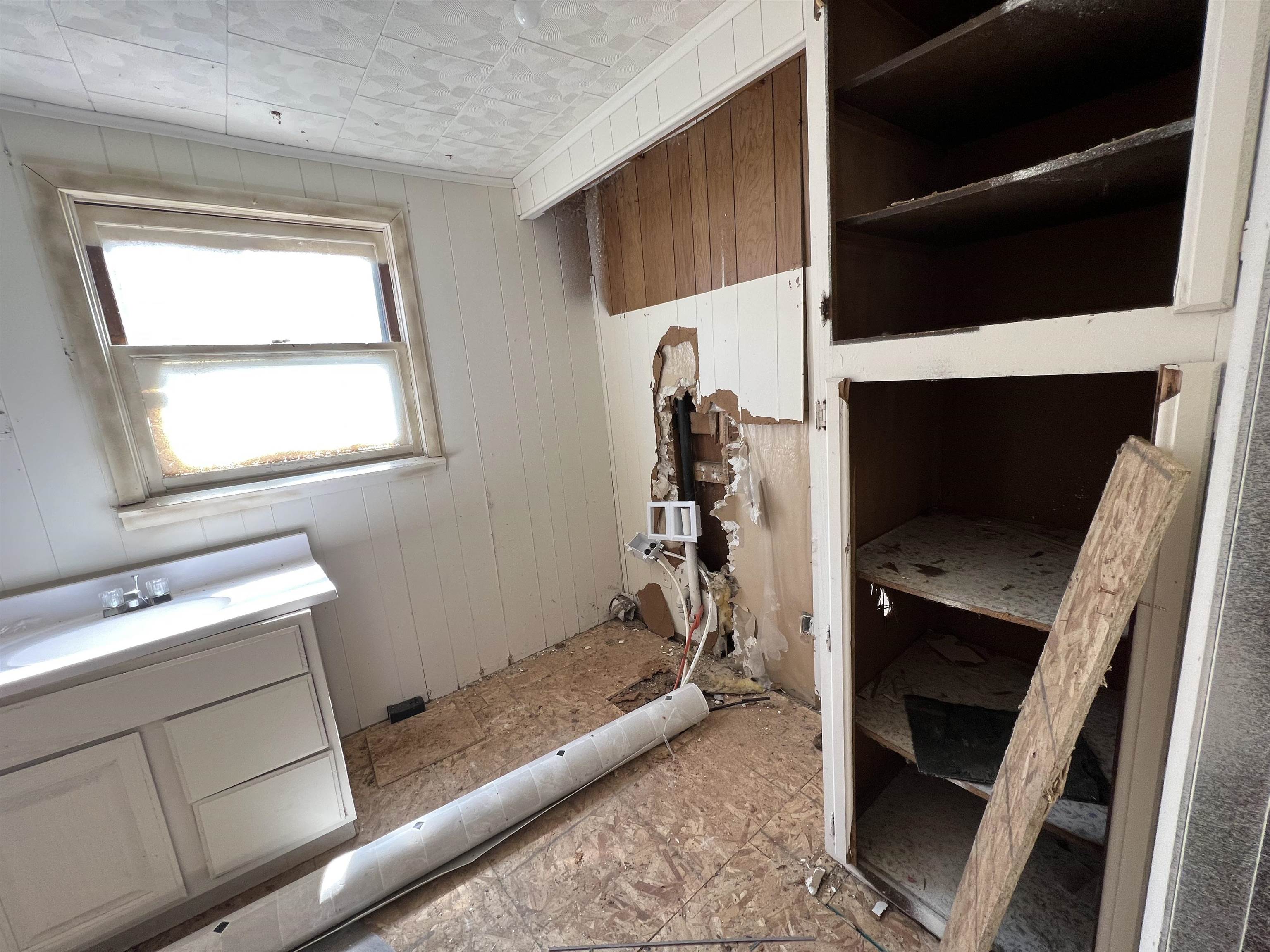 2857 Il Route Thomson, IL 61285 - Photo 17 of 30 a living room with a fireplace furniture a flat screen tv and a window