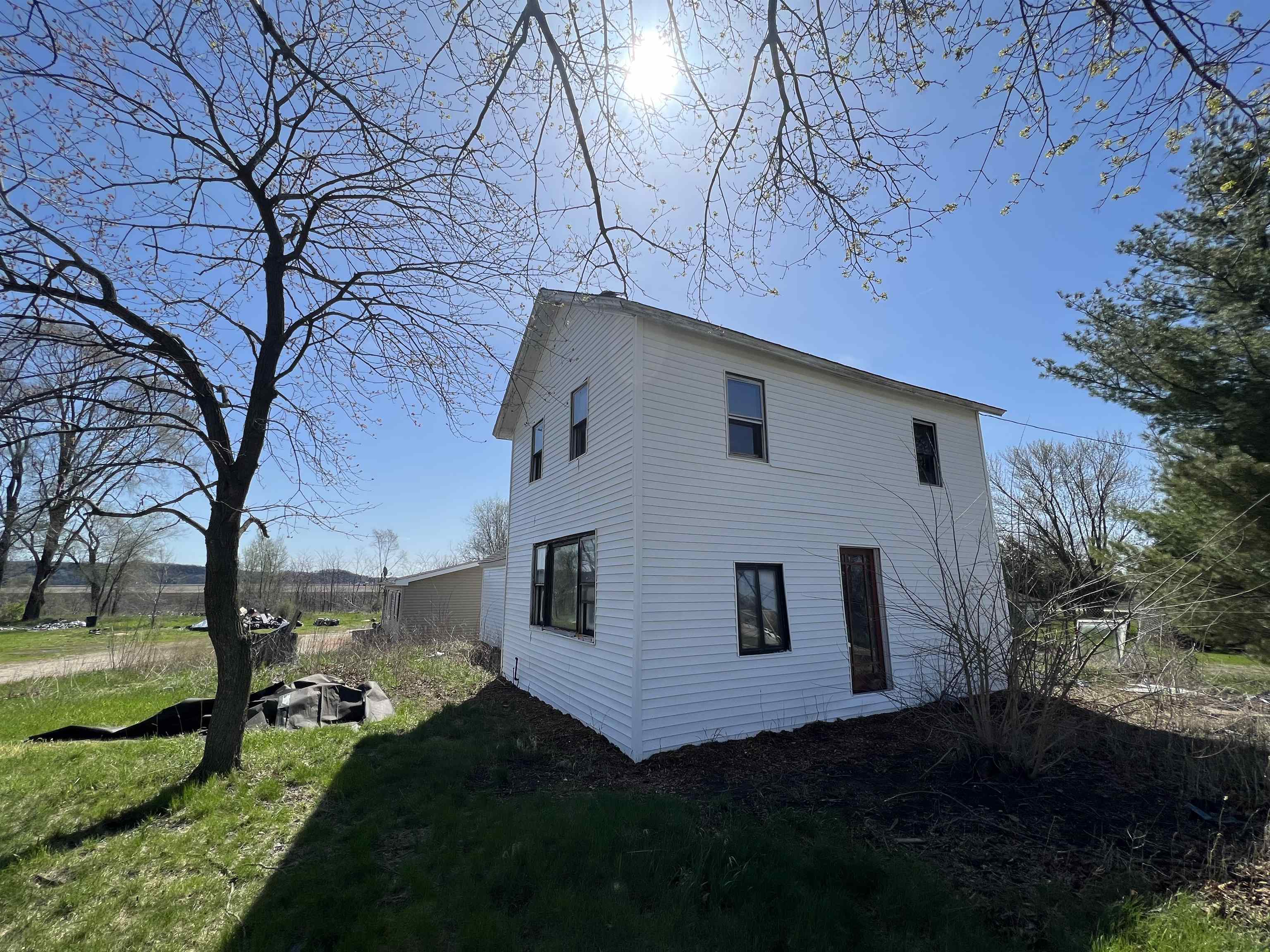 2857 Il Route Thomson, IL 61285 - Photo 28 of 30 a view of a house with backyard and trees