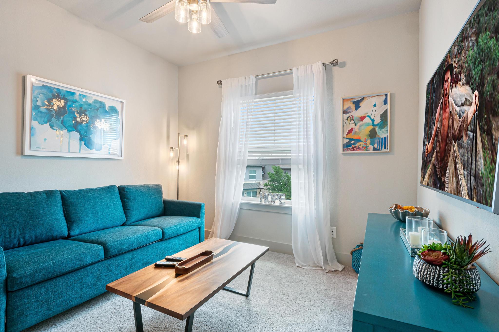 2301 Local Rebel Street Leander, TX 78641 - Photo 18 of 21 a living room with furniture and a window