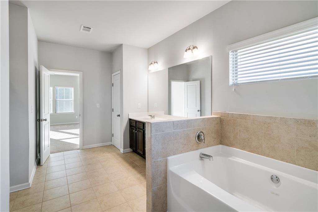 5310 Whisper Point Boulevard Cumming, GA 30028 - Photo 12 of 25