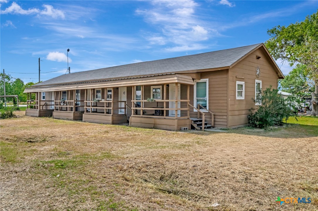 a view of a house with a patio