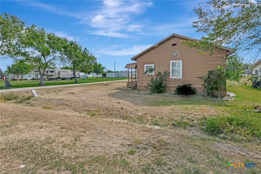 103 5th Street Seadrift, TX 77983 - Photo 17 of 18 a view of a house with a yard