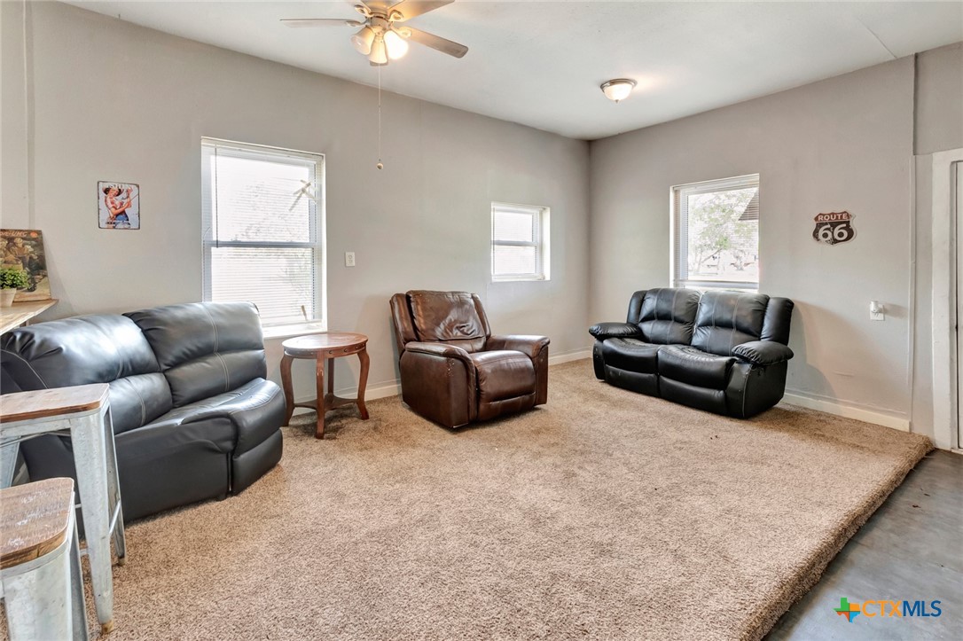 103 5th Street Seadrift, TX 77983 - Photo 7 of 18 a living room with furniture and a window