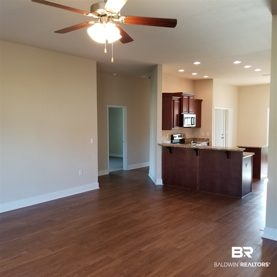 14606 Troon Drive Foley, AL 36535 - Photo 5 of 18 Large Family room open to kitchen with Granit