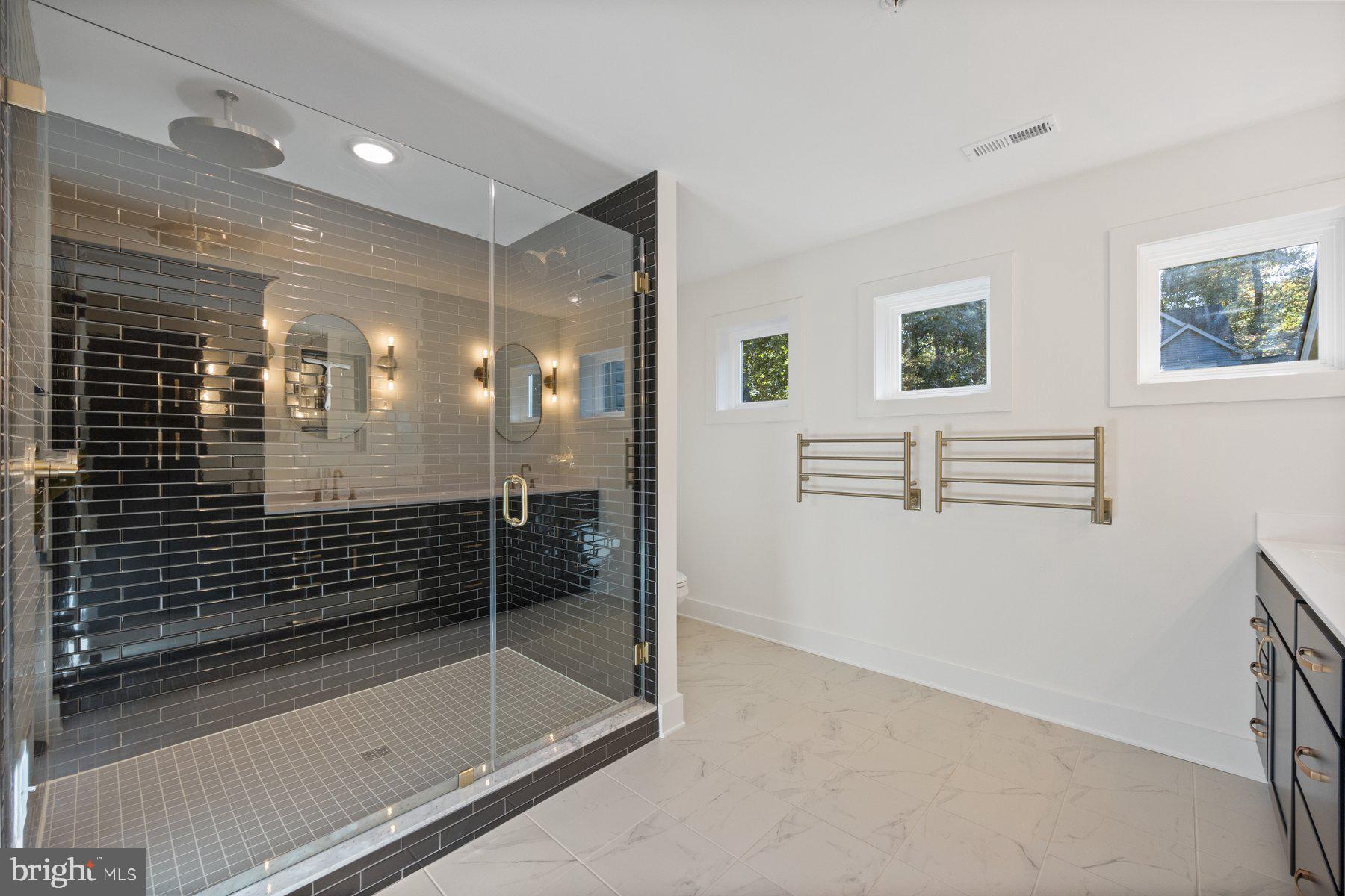6720 Oakridge Road New Market, MD 21774 - Photo 24 of 41 Luxurious primary bath w/ gorgeous tiled shower