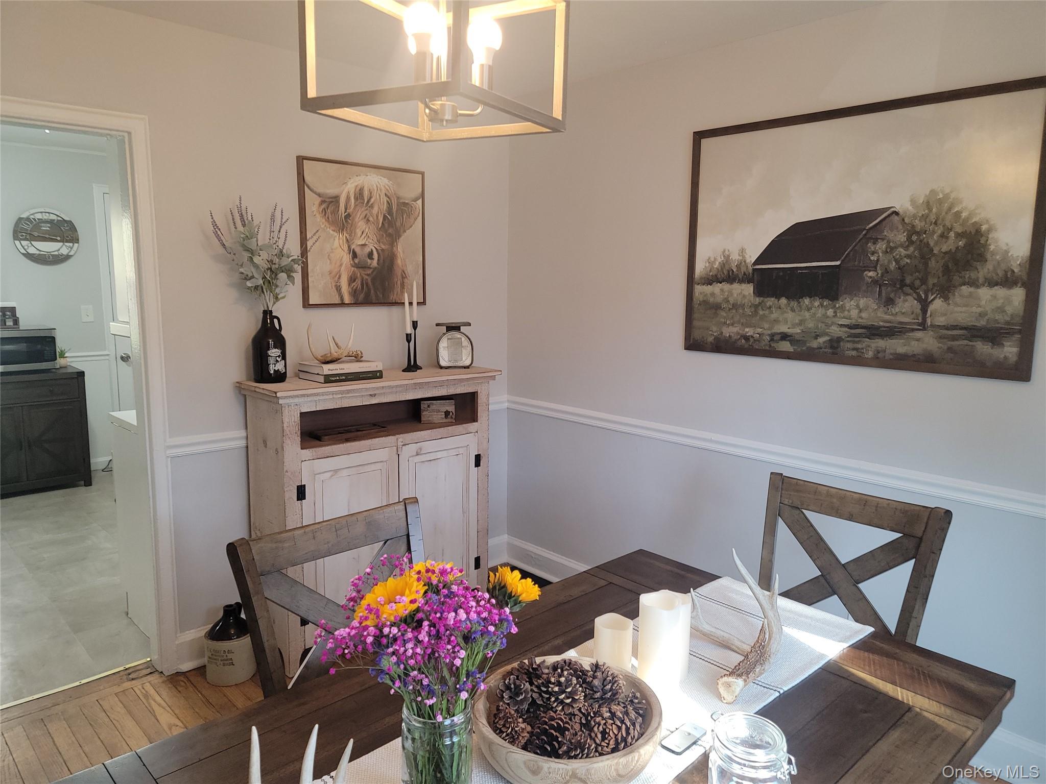 7 Stone Ridge Road Tuxedo Park, NY 10987 - Photo 14 of 33 a dining room with furniture and a chandelier