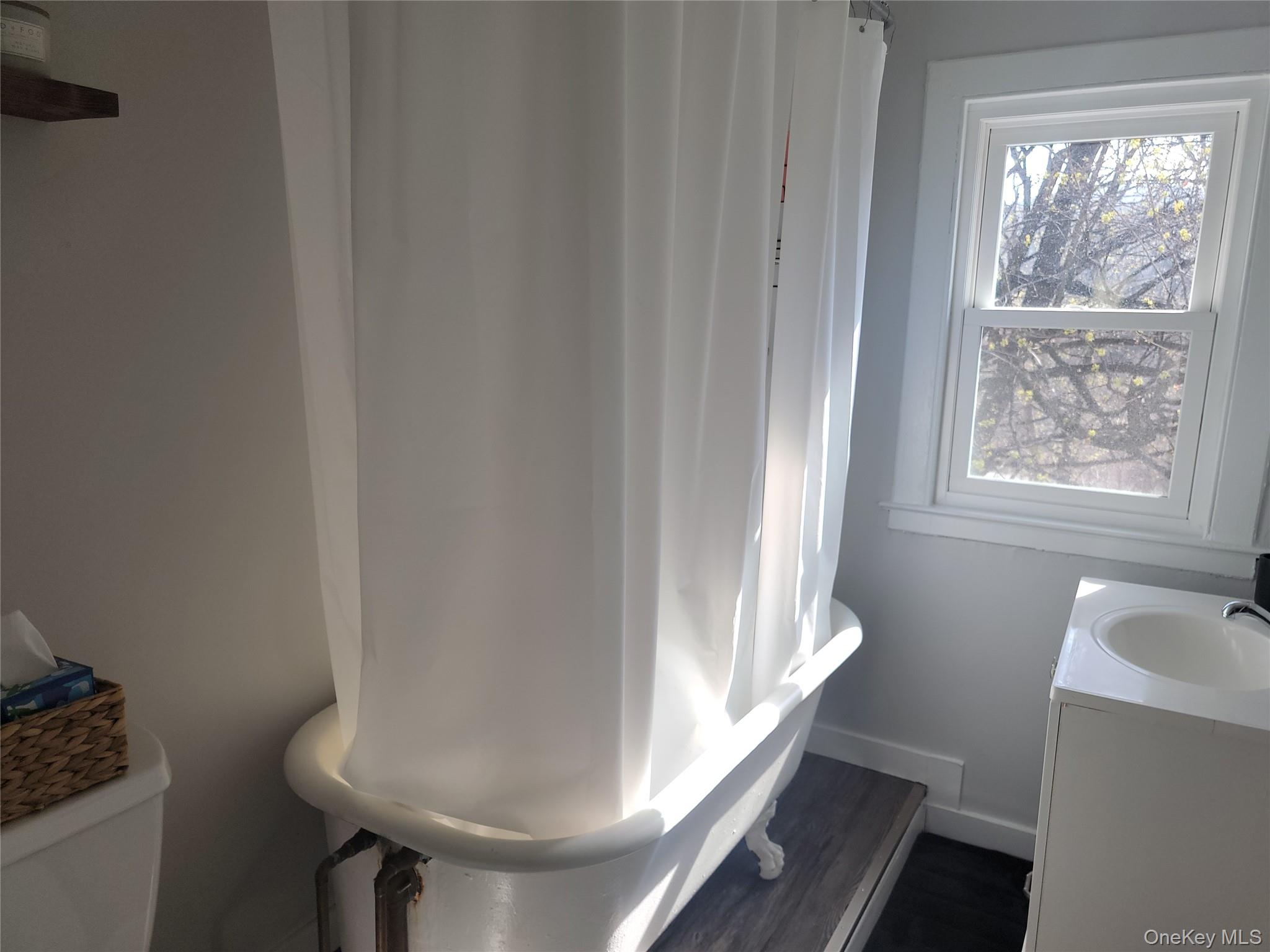 7 Stone Ridge Road Tuxedo Park, NY 10987 - Photo 25 of 33 a bathroom with a sink and a toilet