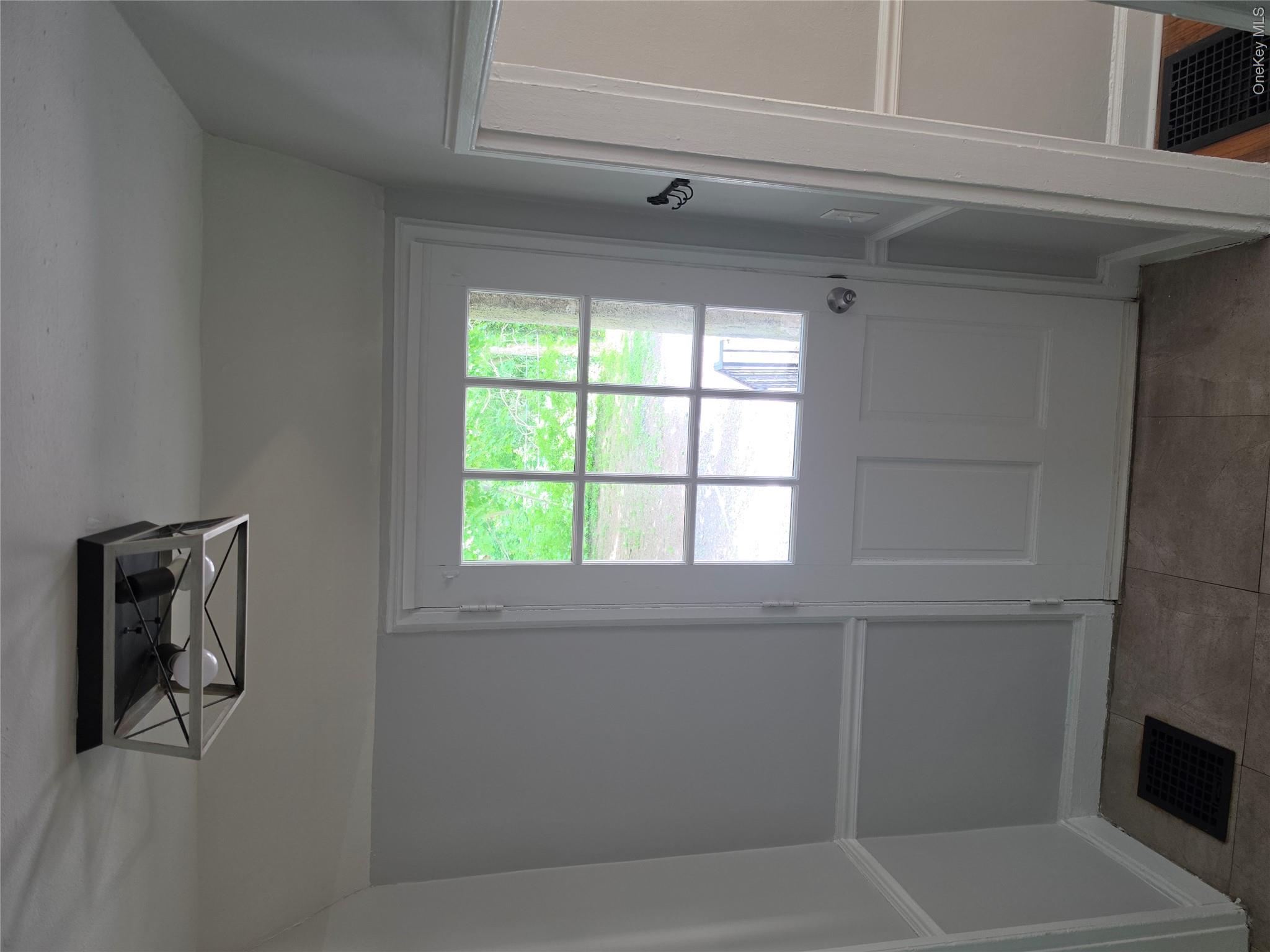7 Stone Ridge Road Tuxedo Park, NY 10987 - Photo 5 of 33 a view of an empty room and window