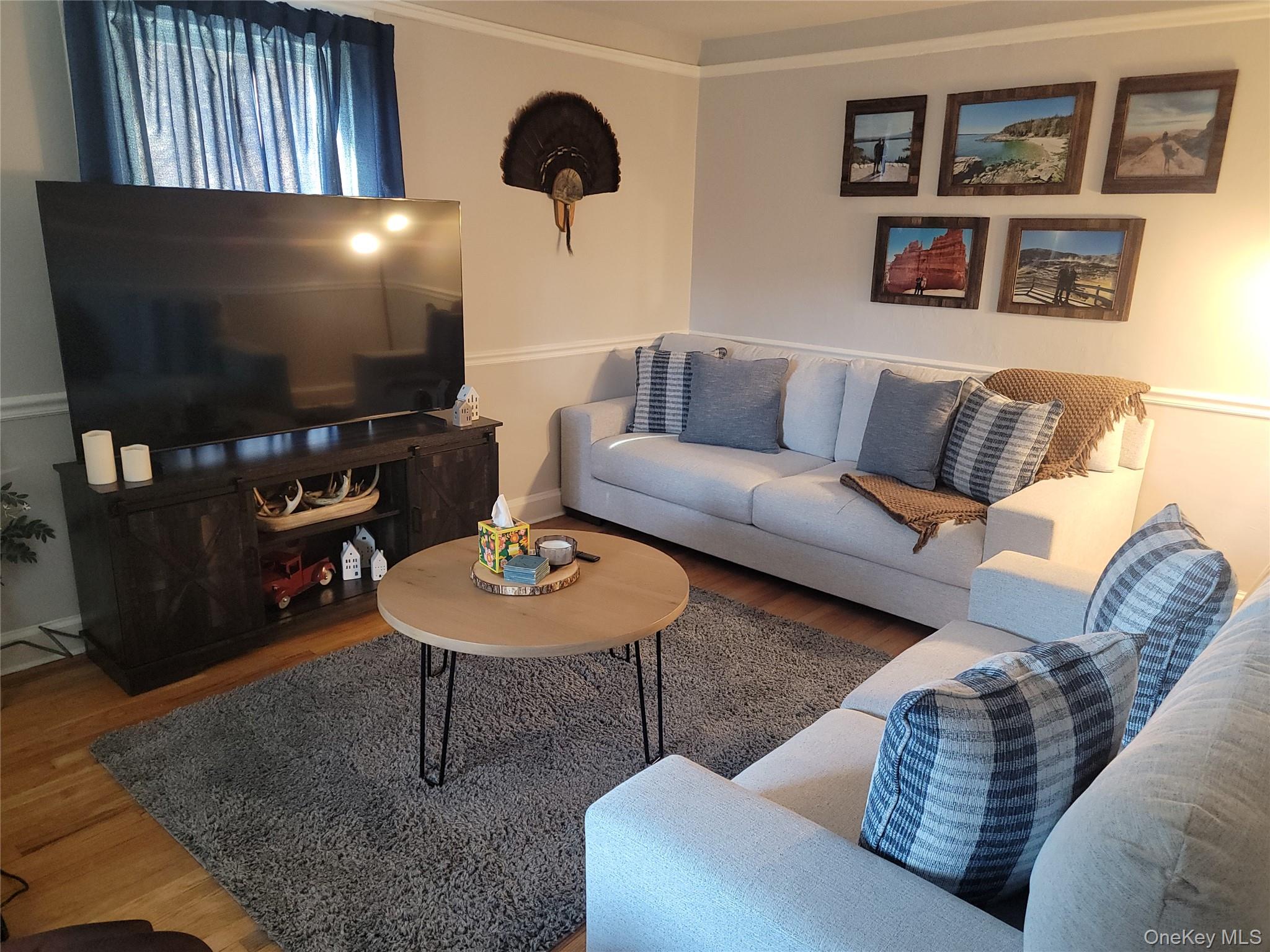 7 Stone Ridge Road Tuxedo Park, NY 10987 - Photo 7 of 33 a living room with furniture and a flat screen tv
