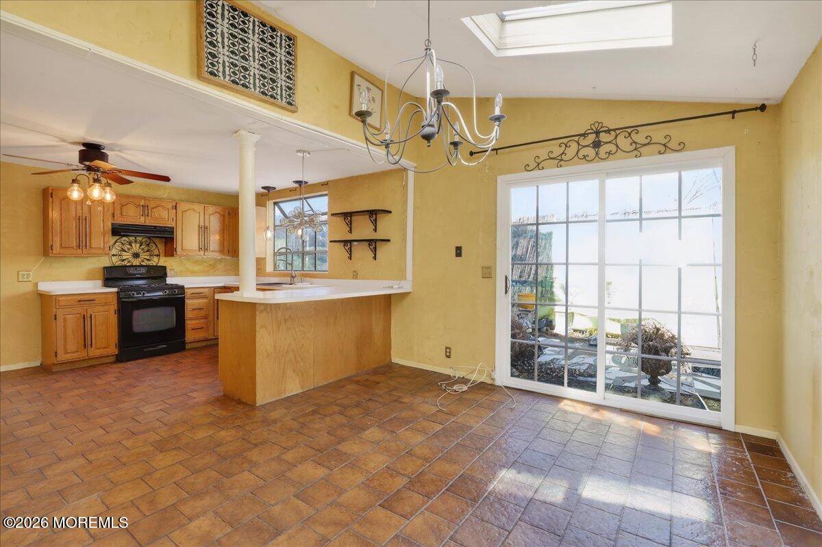 659 Holmdel Road Hazlet, NJ 07730 - Photo 16 of 41 a view of a kitchen with furniture and a kitchen