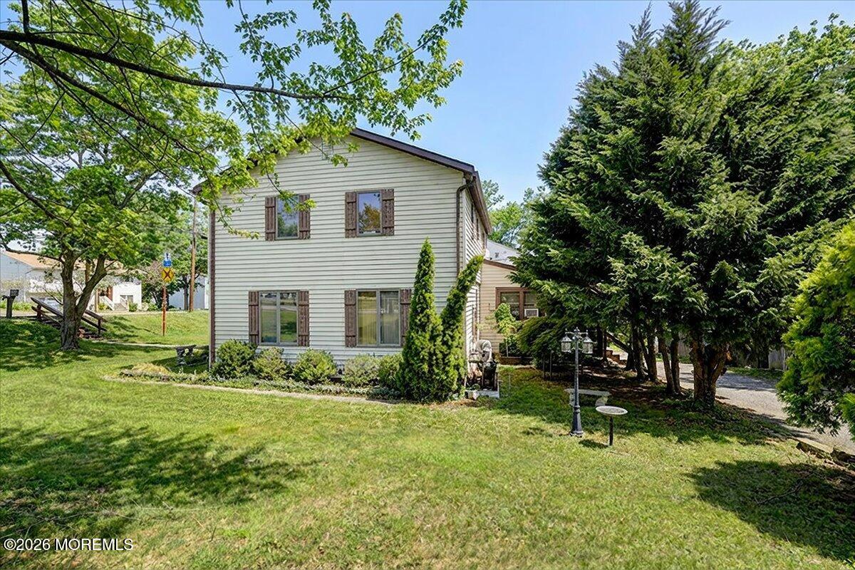 659 Holmdel Road Hazlet, NJ 07730 - Photo 32 of 41 a view of backyard of house with green space