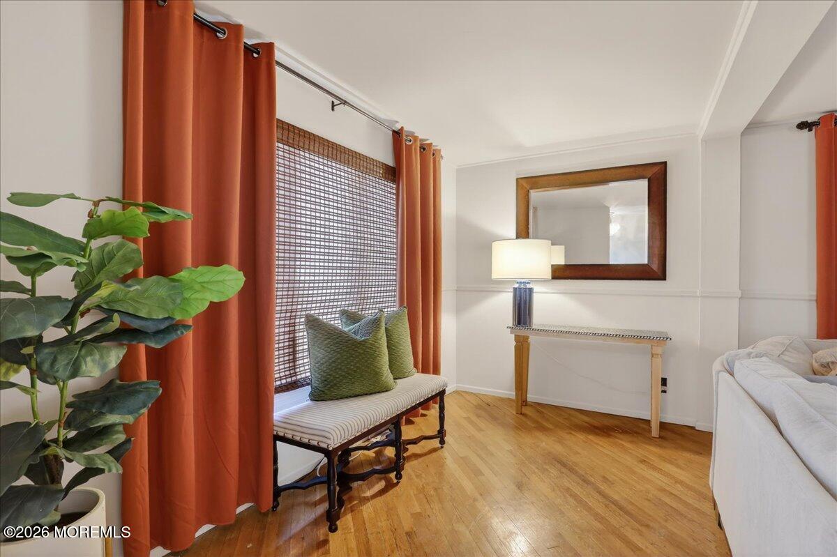659 Holmdel Road Hazlet, NJ 07730 - Photo 8 of 41 a living room with furniture and a potted plant