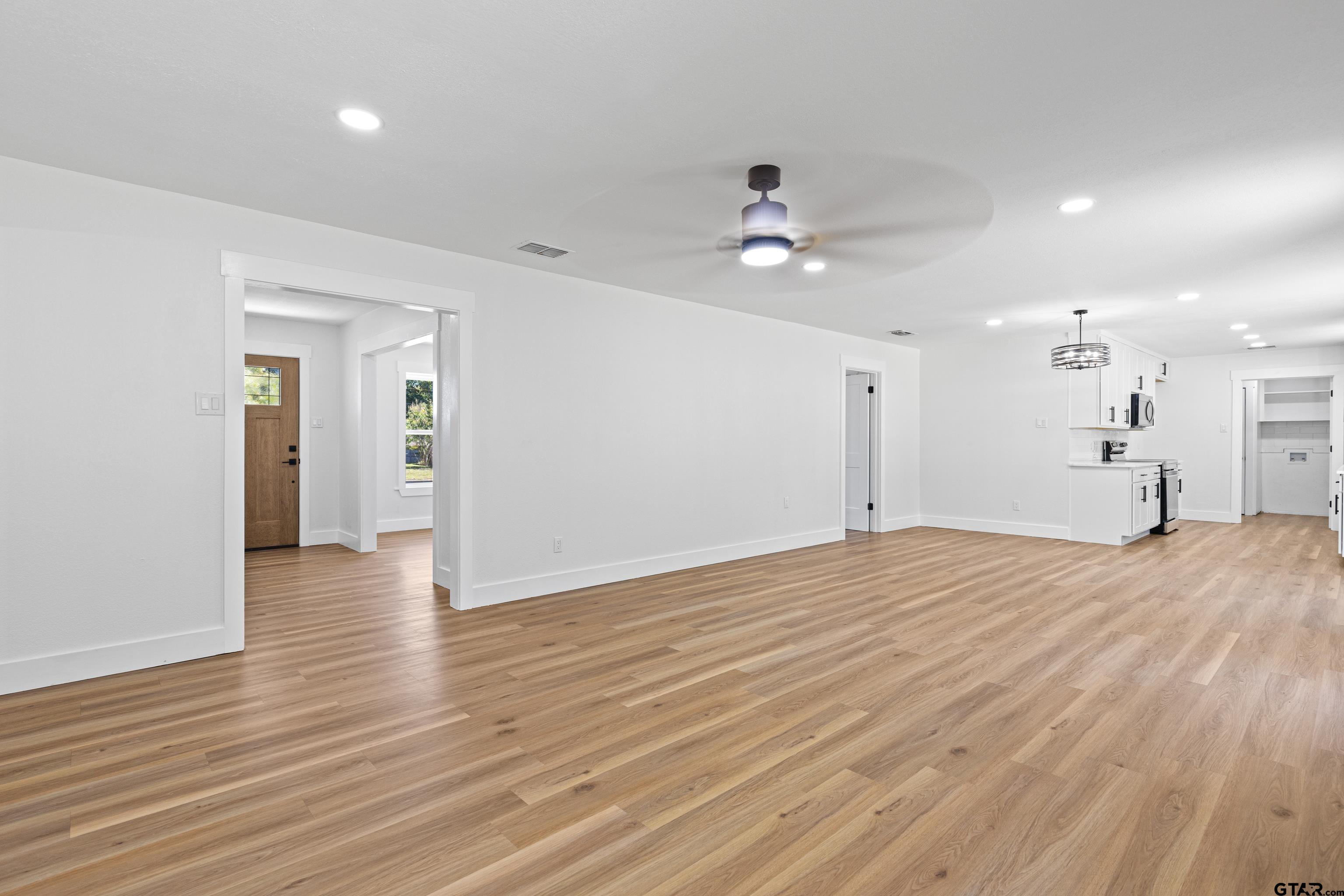 1907 Beth Drive Longview, TX 75605 - Photo 16 of 40 a view of empty room with wooden floor