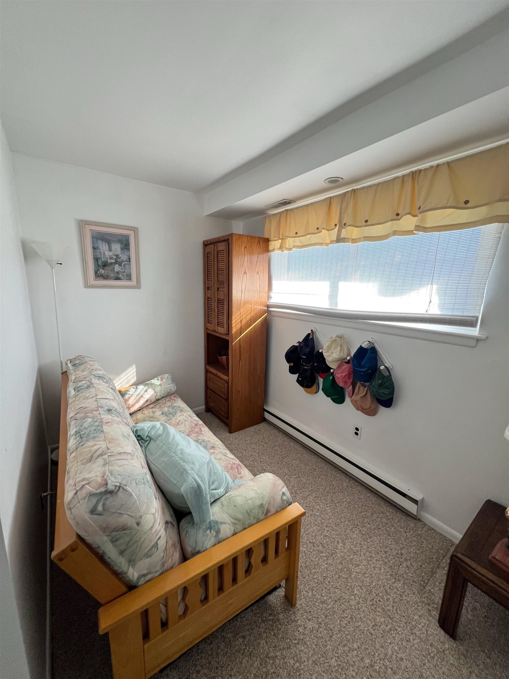 386 24th Street, Unit UPPR Avalon, NJ 08202 - Photo 12 of 34 a living room with furniture and a window