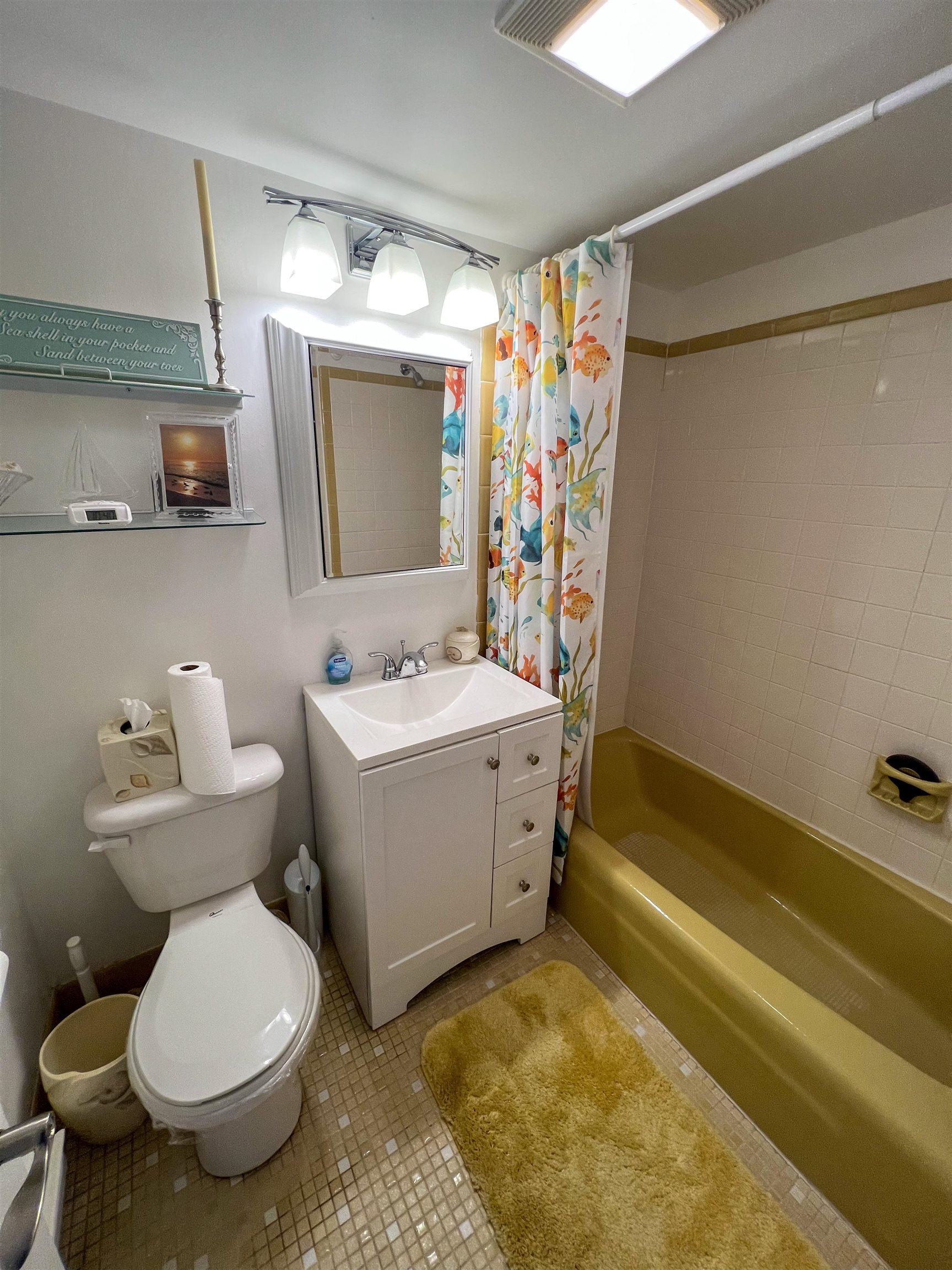 386 24th Street, Unit UPPR Avalon, NJ 08202 - Photo 13 of 34 a bathroom with a sink toilet and shower