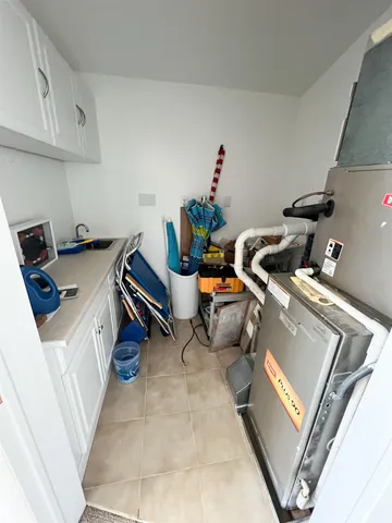 a storage room with washer and dryer