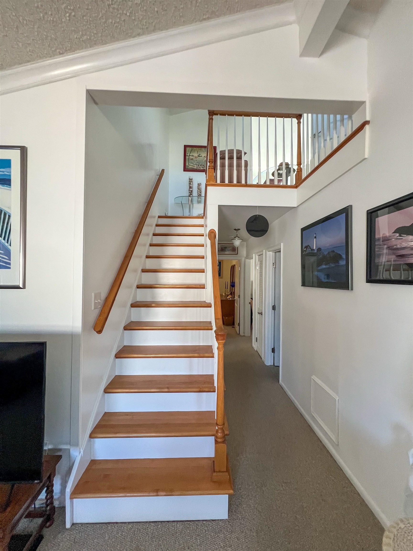 386 24th Street, Unit UPPR Avalon, NJ 08202 - Photo 19 of 34 a view of entryway and hall with wooden floor