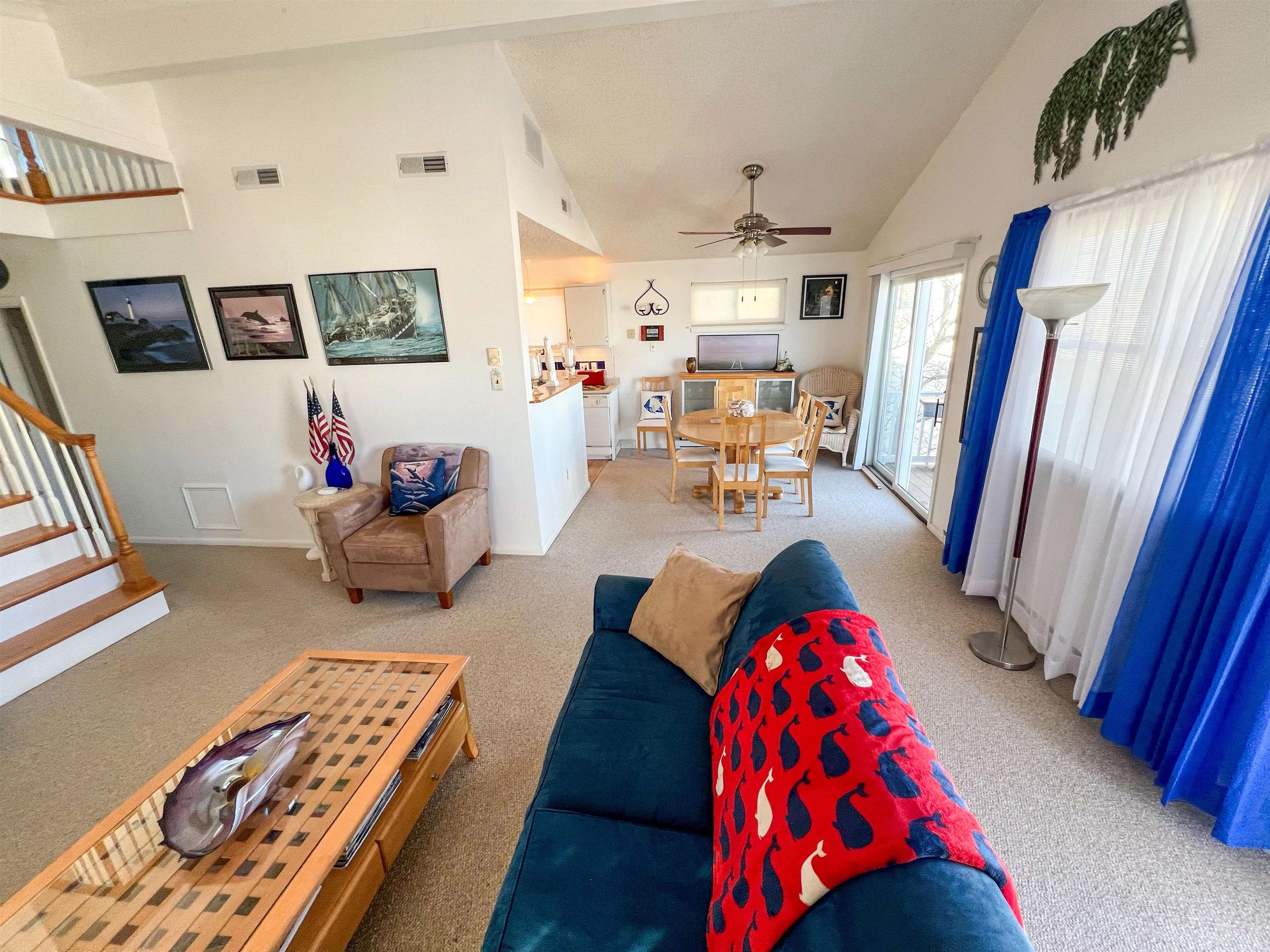 386 24th Street, Unit UPPR Avalon, NJ 08202 - Photo 2 of 34 a living room with furniture and a rug