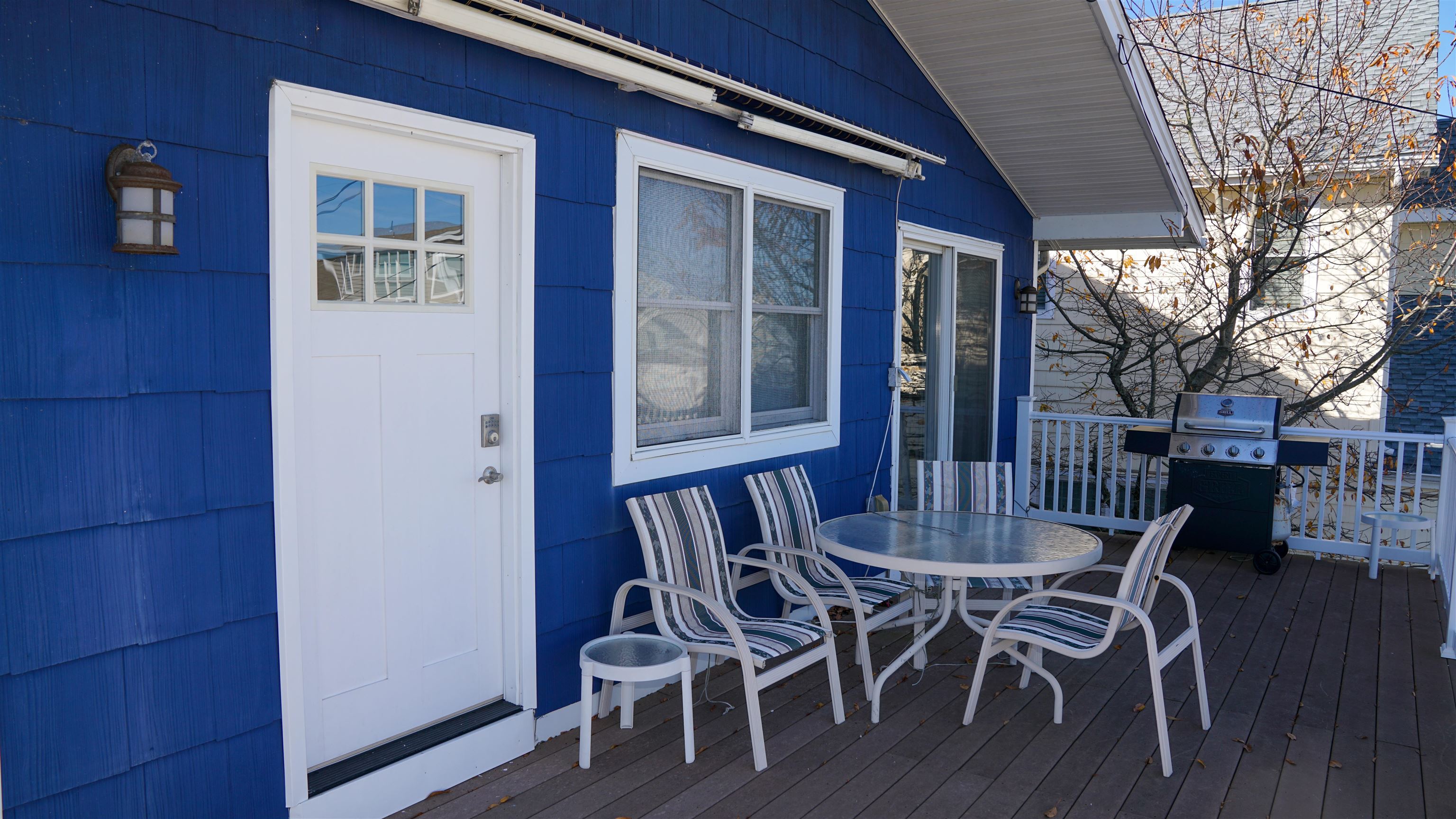 386 24th Street, Unit UPPR Avalon, NJ 08202 - Photo 27 of 34 a view of a dining room with furniture and wooden floor