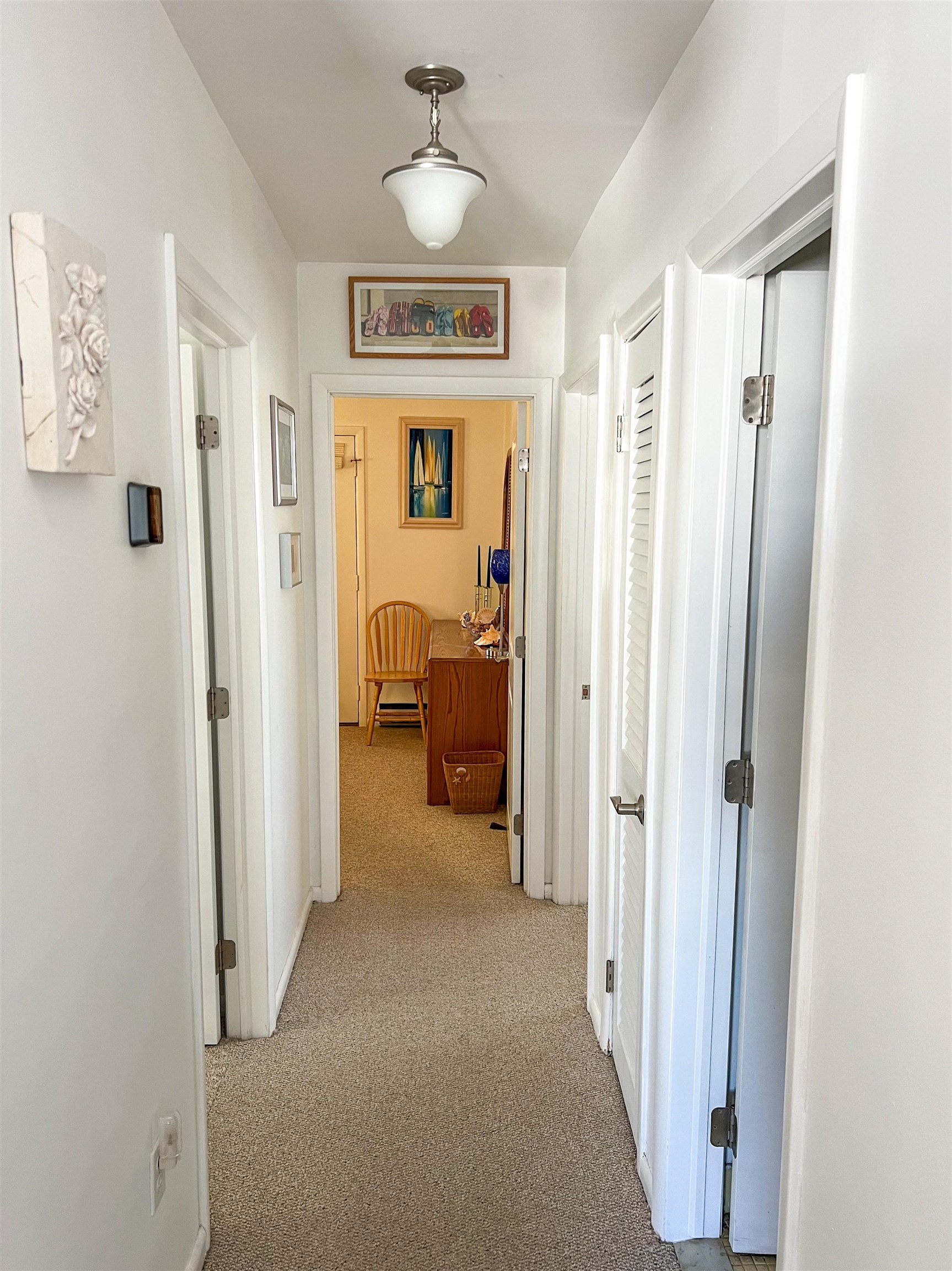 386 24th Street, Unit UPPR Avalon, NJ 08202 - Photo 8 of 34 a view of a hallway with closet and entryway