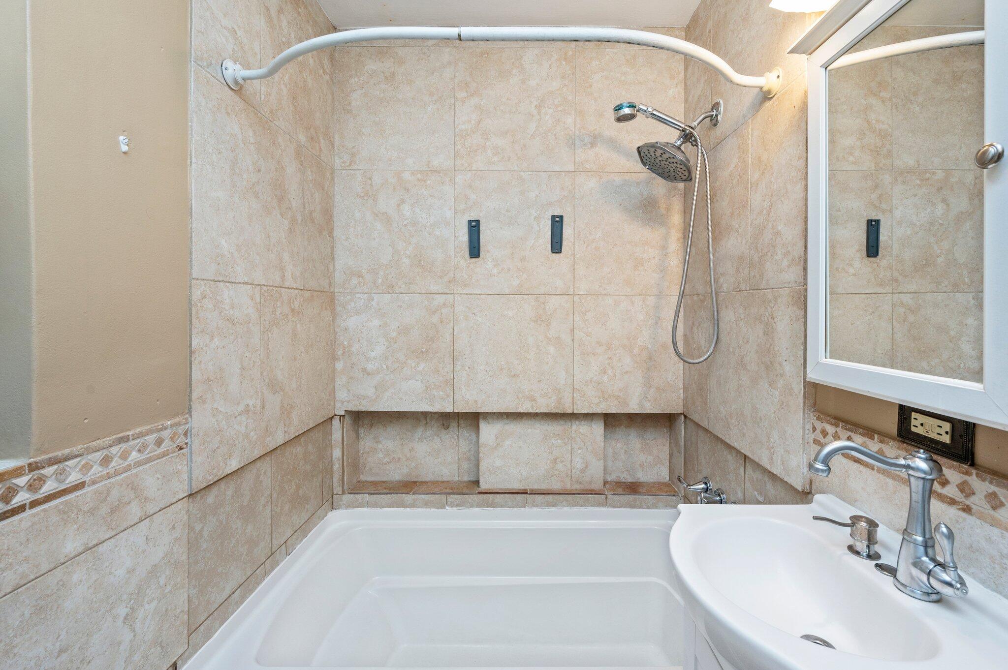 101 Seminole Trail Crestview, FL 32536 - Photo 22 of 30 a bathroom with a sink and shower