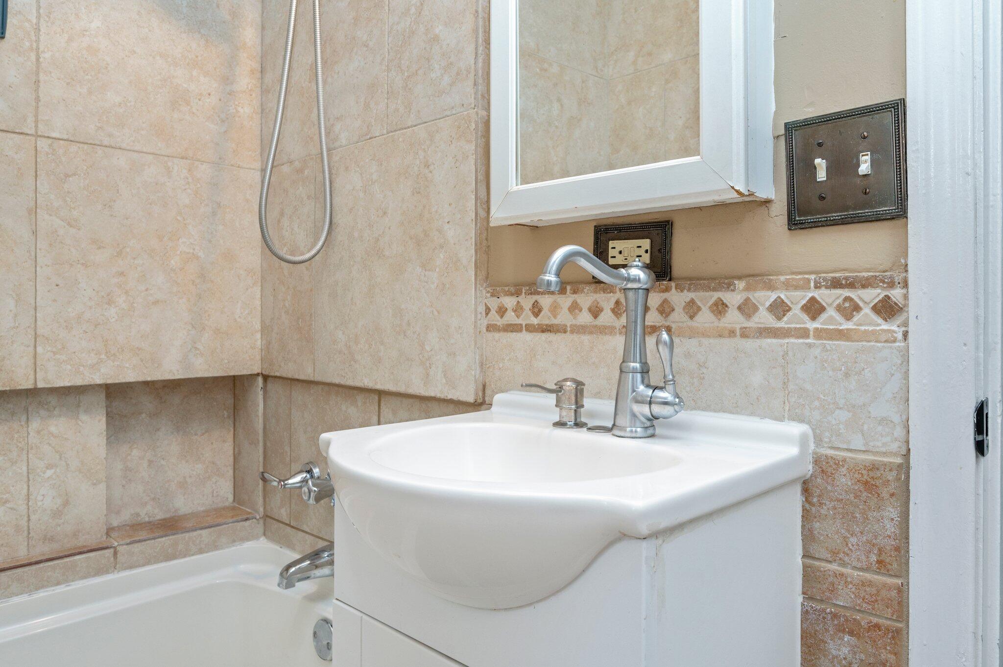101 Seminole Trail Crestview, FL 32536 - Photo 23 of 30 a bathroom with a sink and a mirror