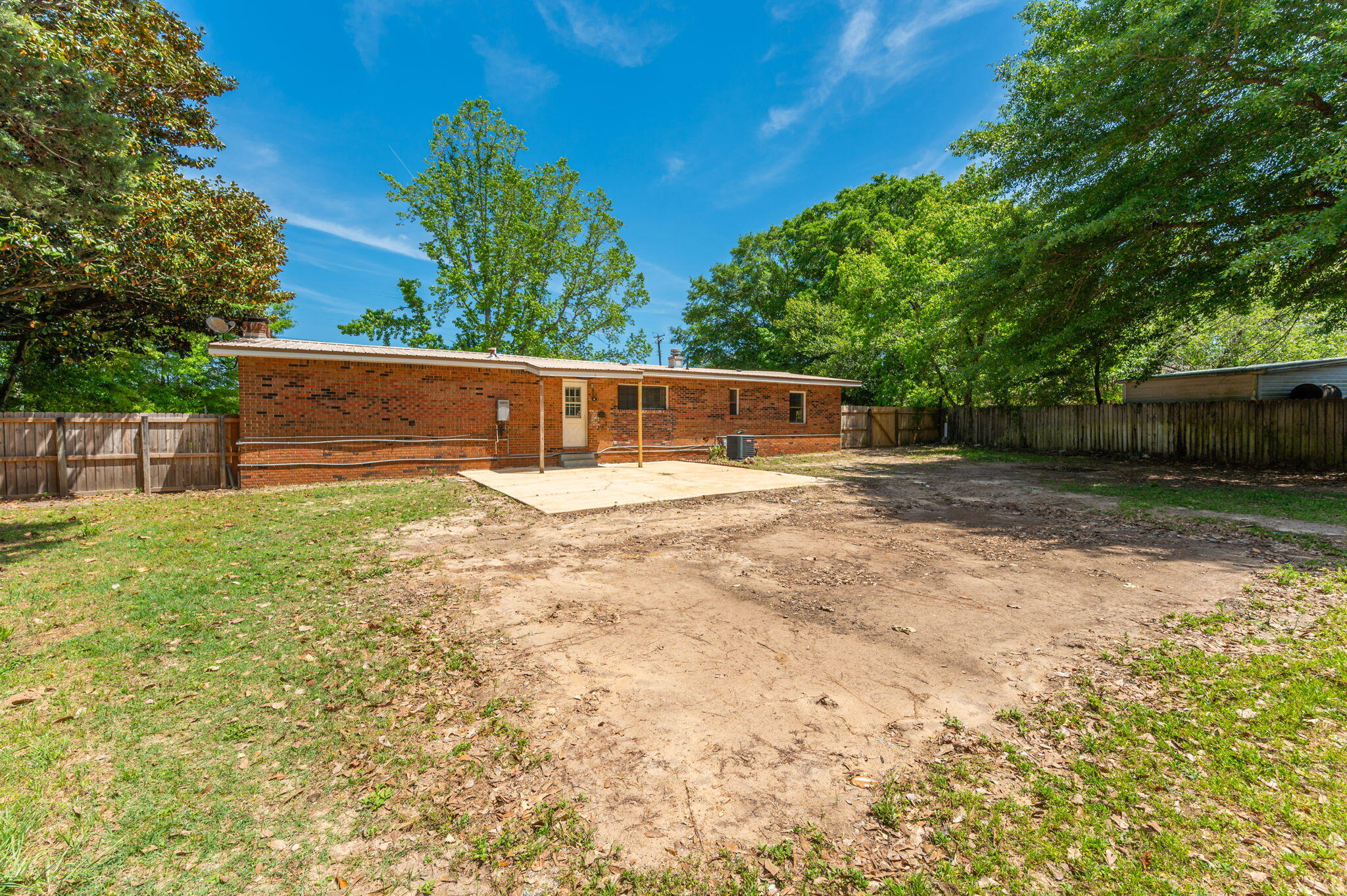 101 Seminole Trail Crestview, FL 32536 - Photo 26 of 30 a view of a house with a backyard