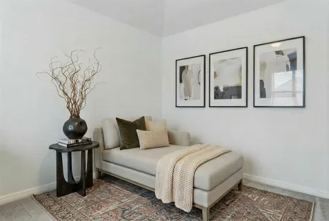 a bedroom with bed and window