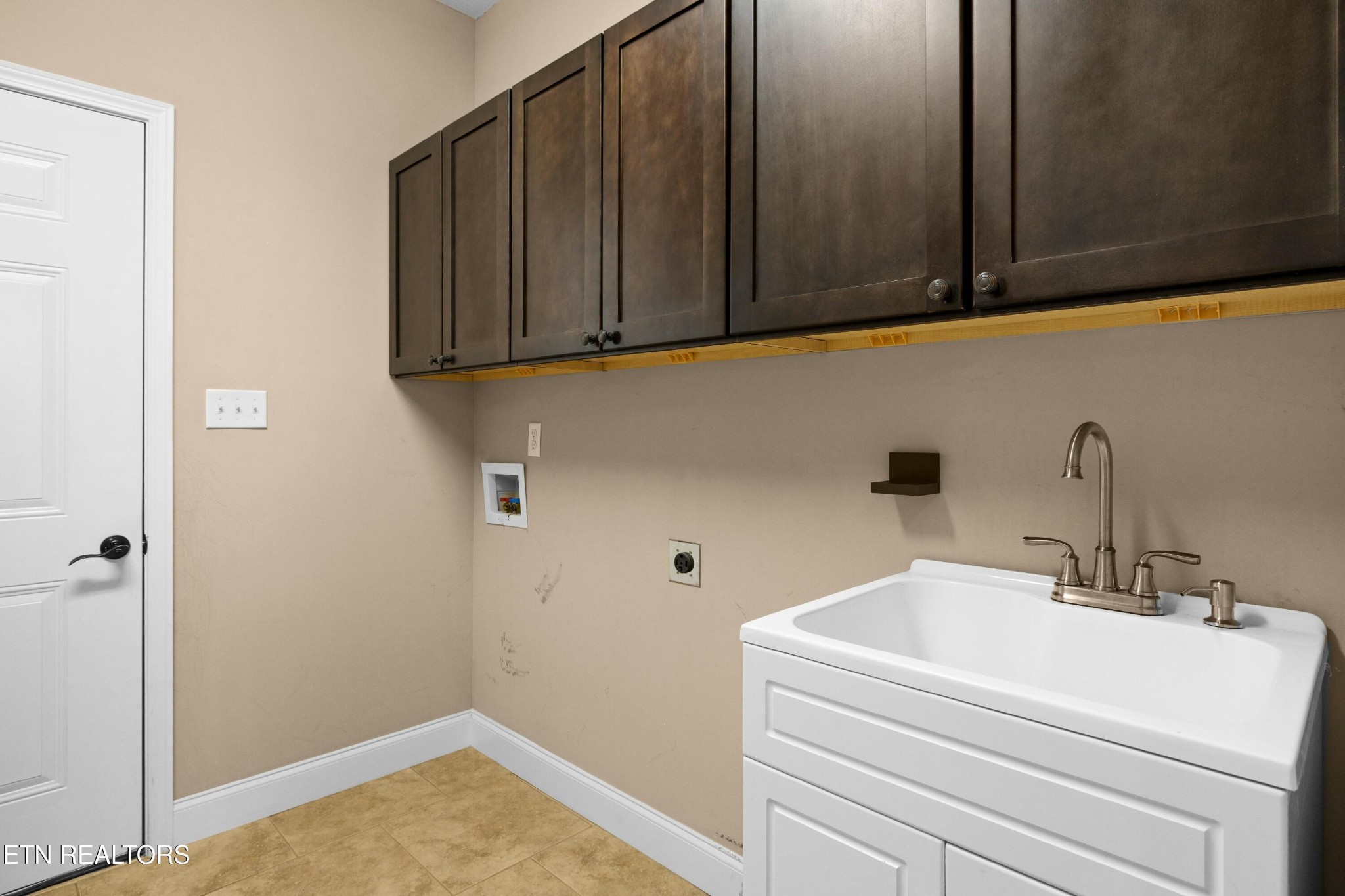 402 Lee Lambert Road Maryville, TN 37803 - Photo 14 of 41 a bathroom with a sink and cabinets