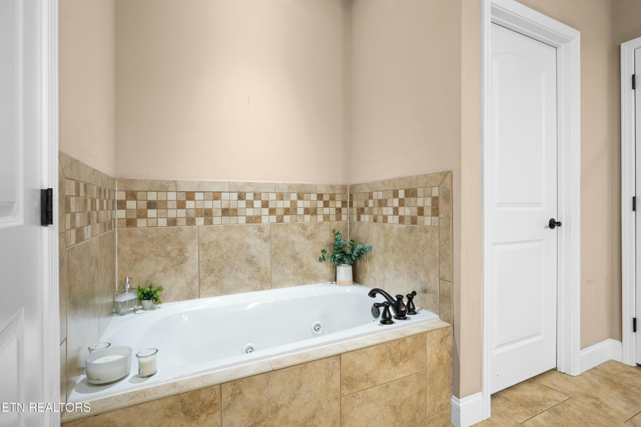 402 Lee Lambert Road Maryville, TN 37803 - Photo 22 of 41 a bathroom with a bathtub and shower