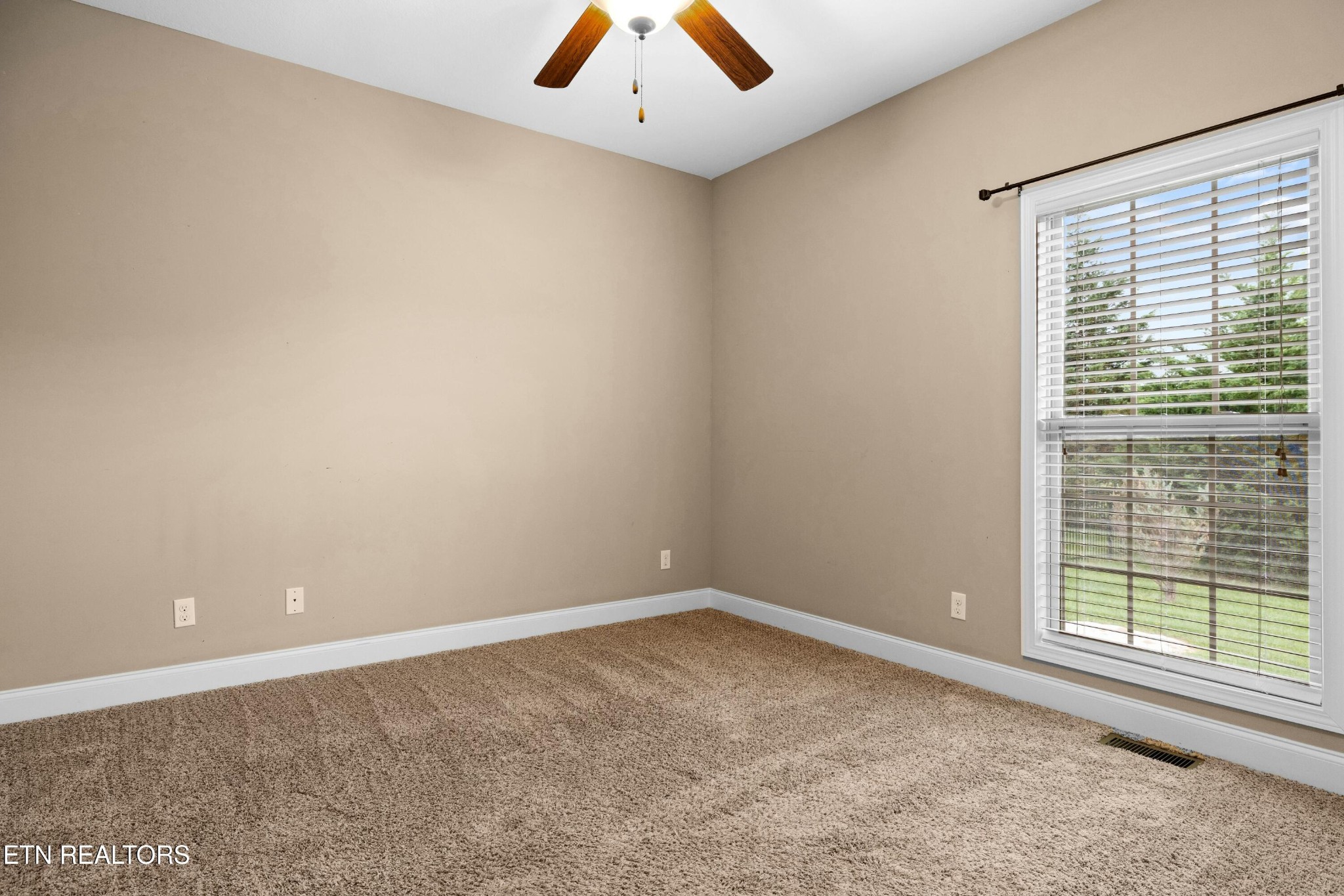402 Lee Lambert Road Maryville, TN 37803 - Photo 23 of 41 an empty room with a window