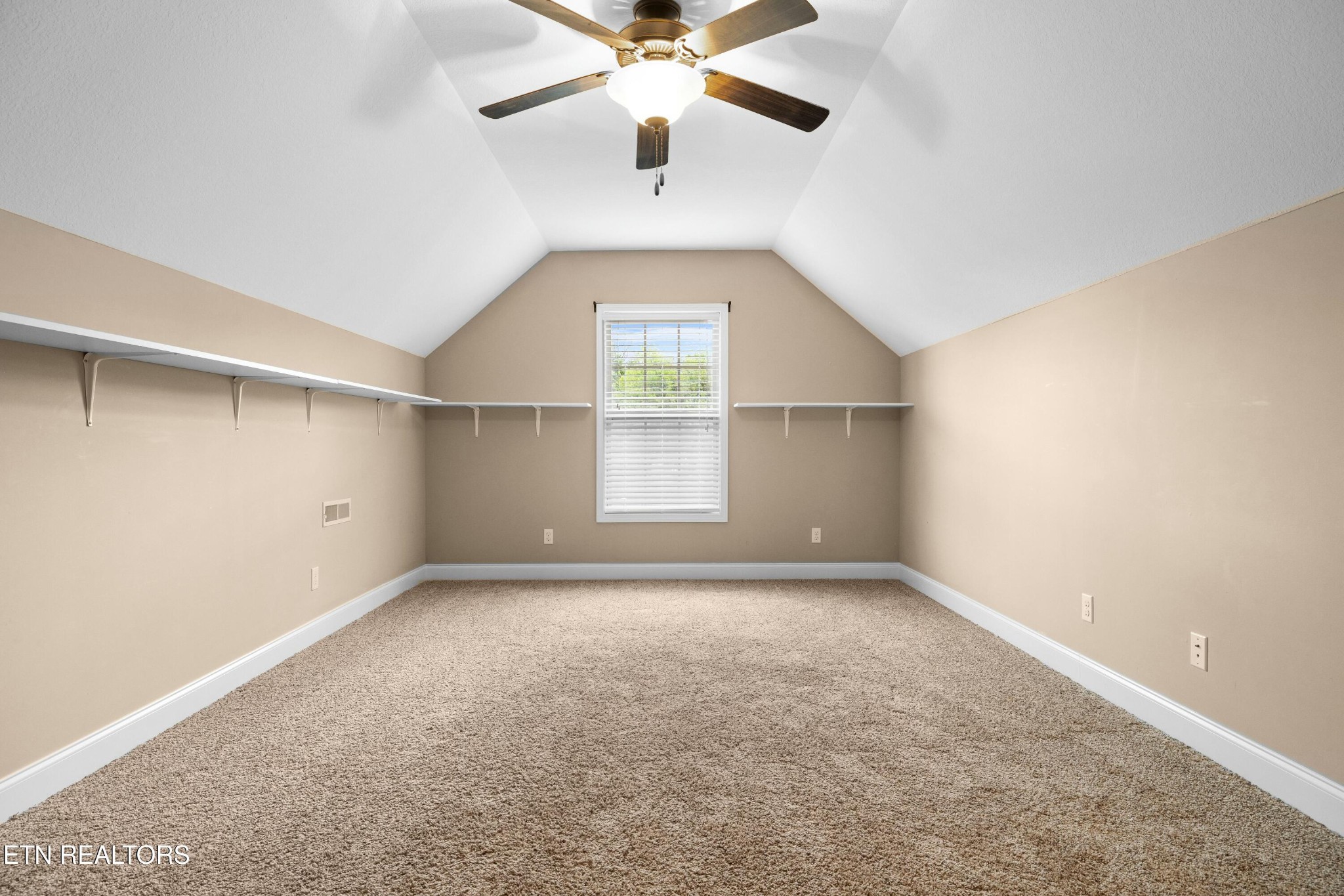 402 Lee Lambert Road Maryville, TN 37803 - Photo 27 of 41 an empty room with windows and fan