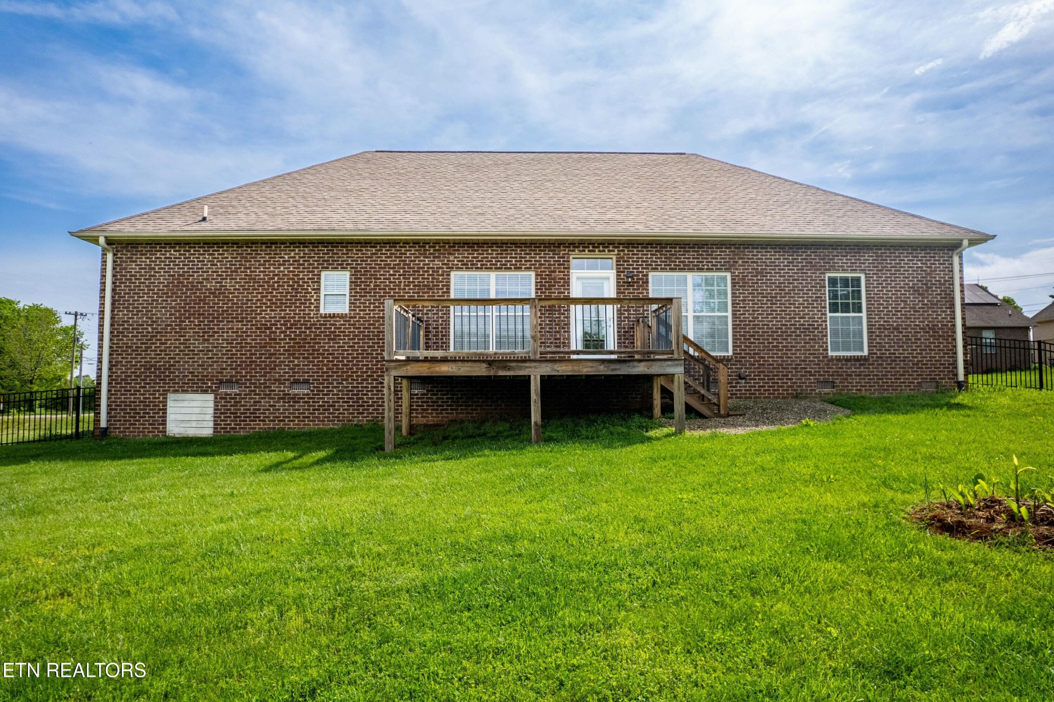 402 Lee Lambert Road Maryville, TN 37803 - Photo 31 of 41 a front view of a house with a garden