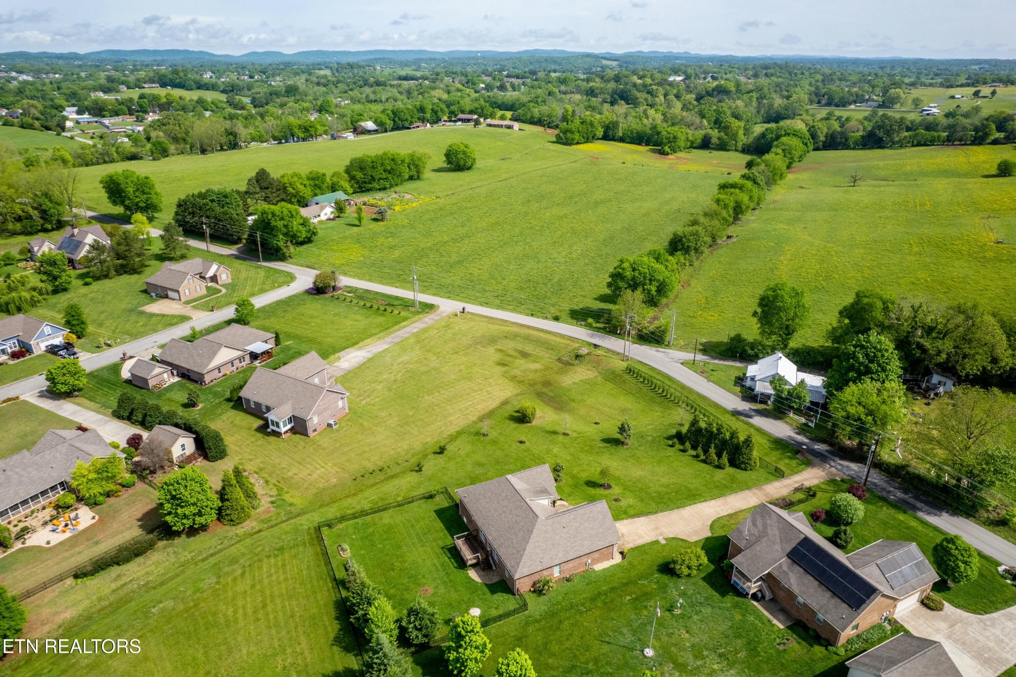 402 Lee Lambert Road Maryville, TN 37803 - Photo 34 of 41 a view of a lake with a houses