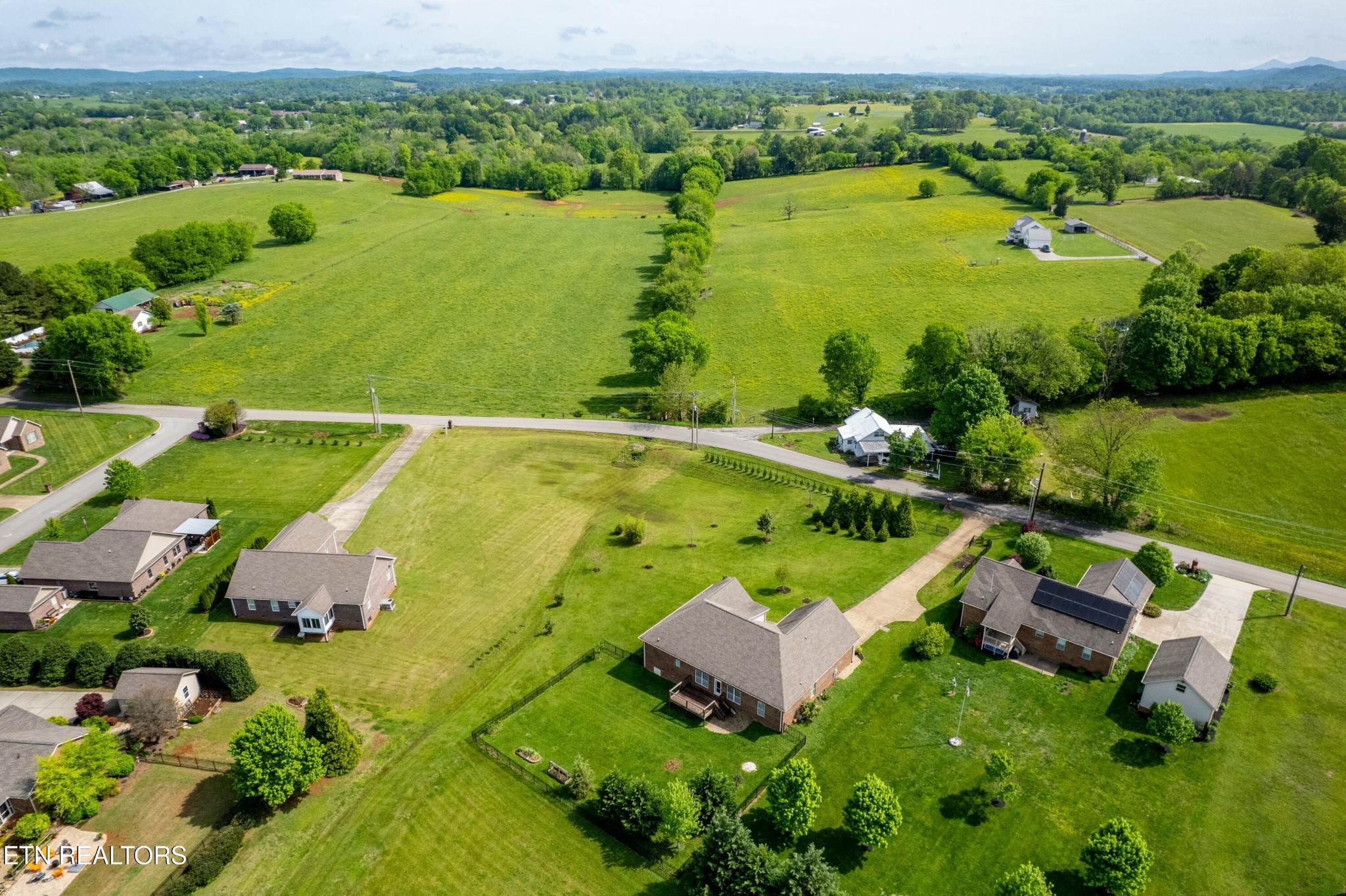 402 Lee Lambert Road Maryville, TN 37803 - Photo 35 of 41 an aerial view of a house with a garden and lake view