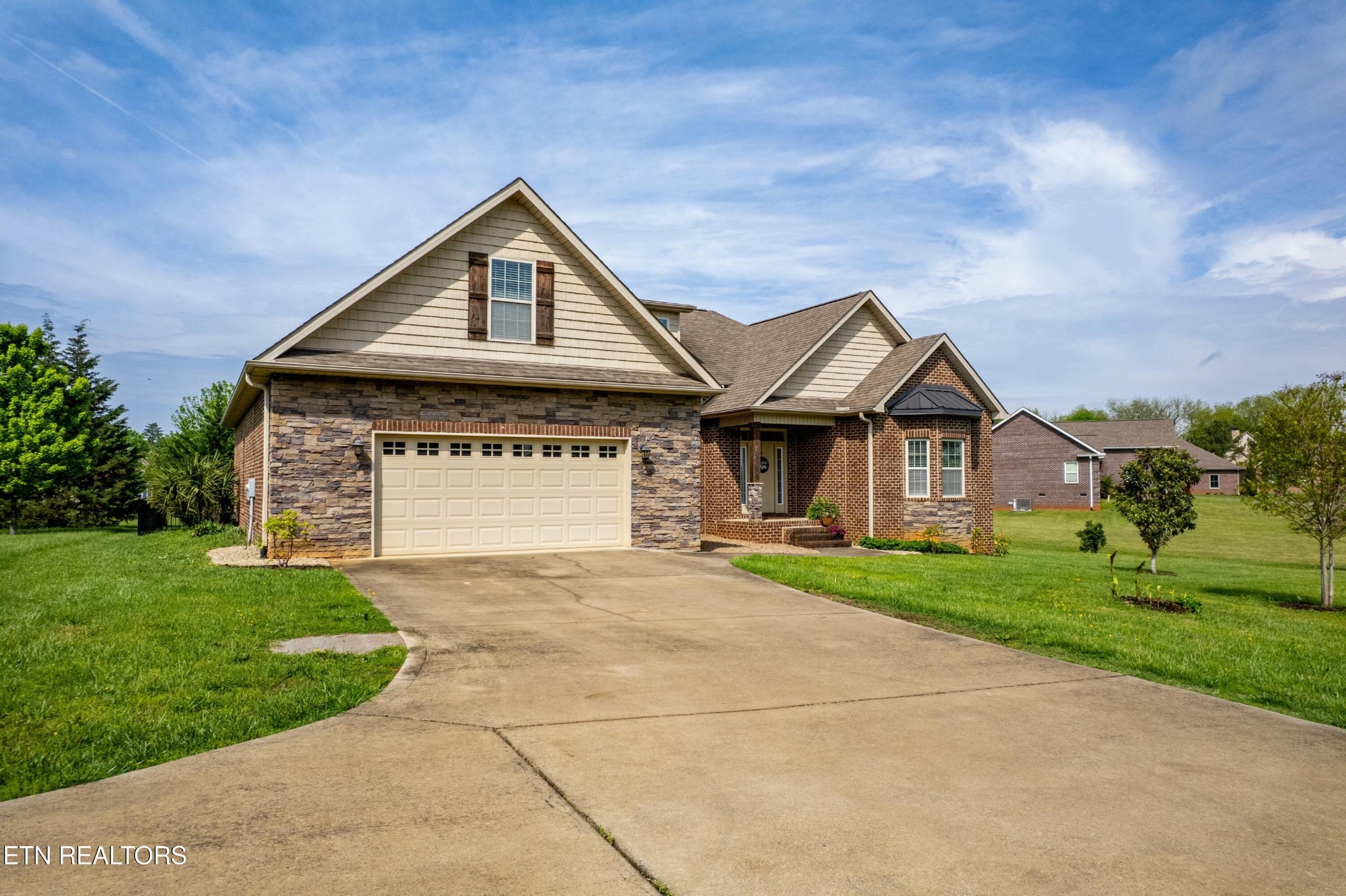 402 Lee Lambert Road Maryville, TN 37803 - Photo 41 of 41 a front view of a house with a yard and garage