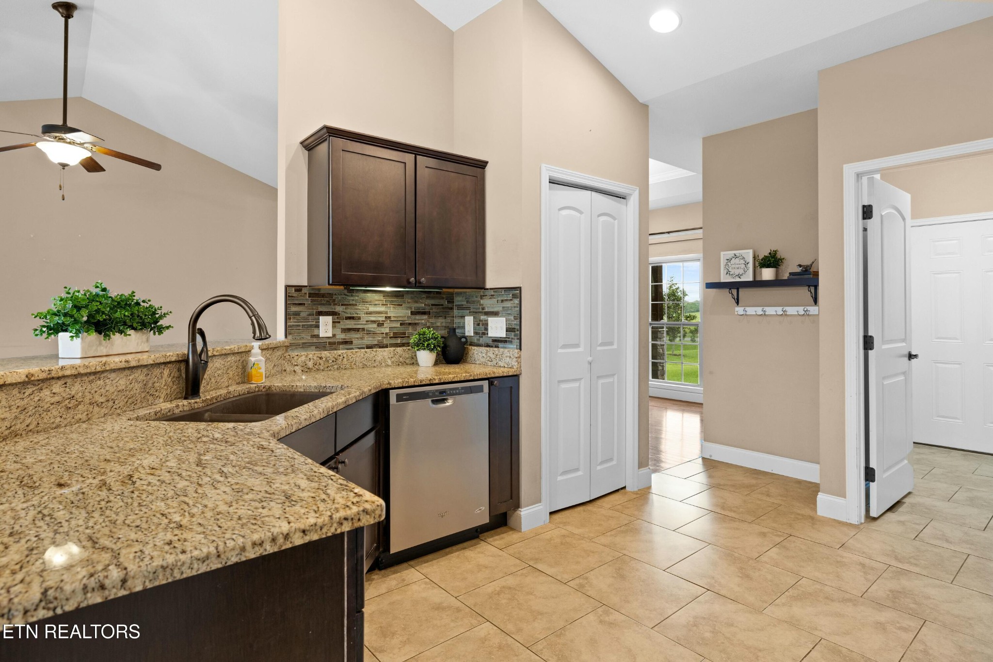402 Lee Lambert Road Maryville, TN 37803 - Photo 10 of 41 a kitchen with refrigerator and cabinets