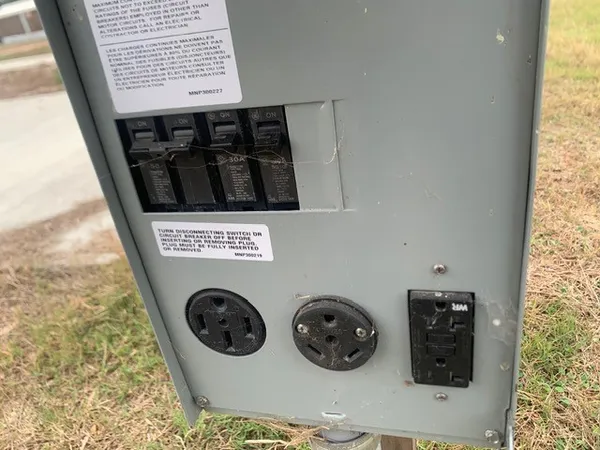 a view of a lake with houses in the background