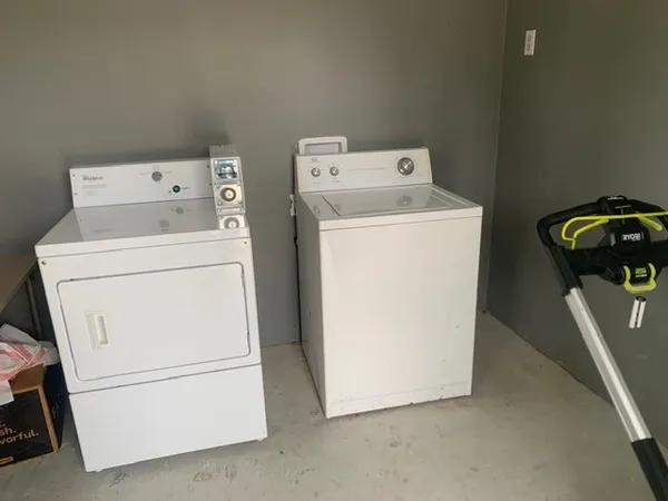 a bathroom with a toilet and a sink