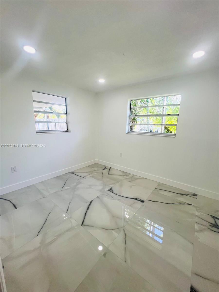 15530 Southwest 295th Terrace Homestead, FL 33033 - Photo 13 of 14 a view of empty room with windows