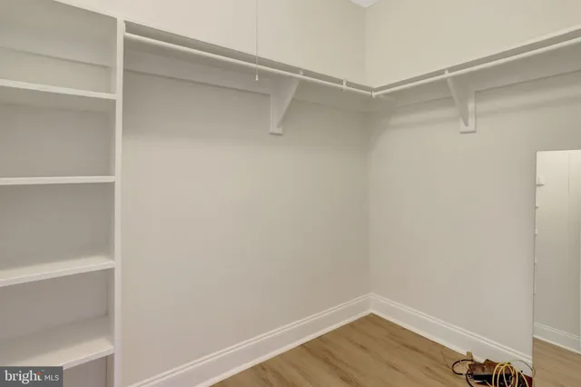 a view of an empty walk in closet