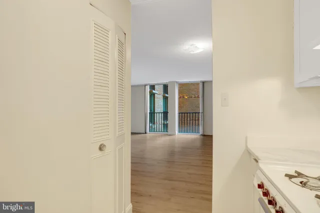 a view of a hallway with an empty room