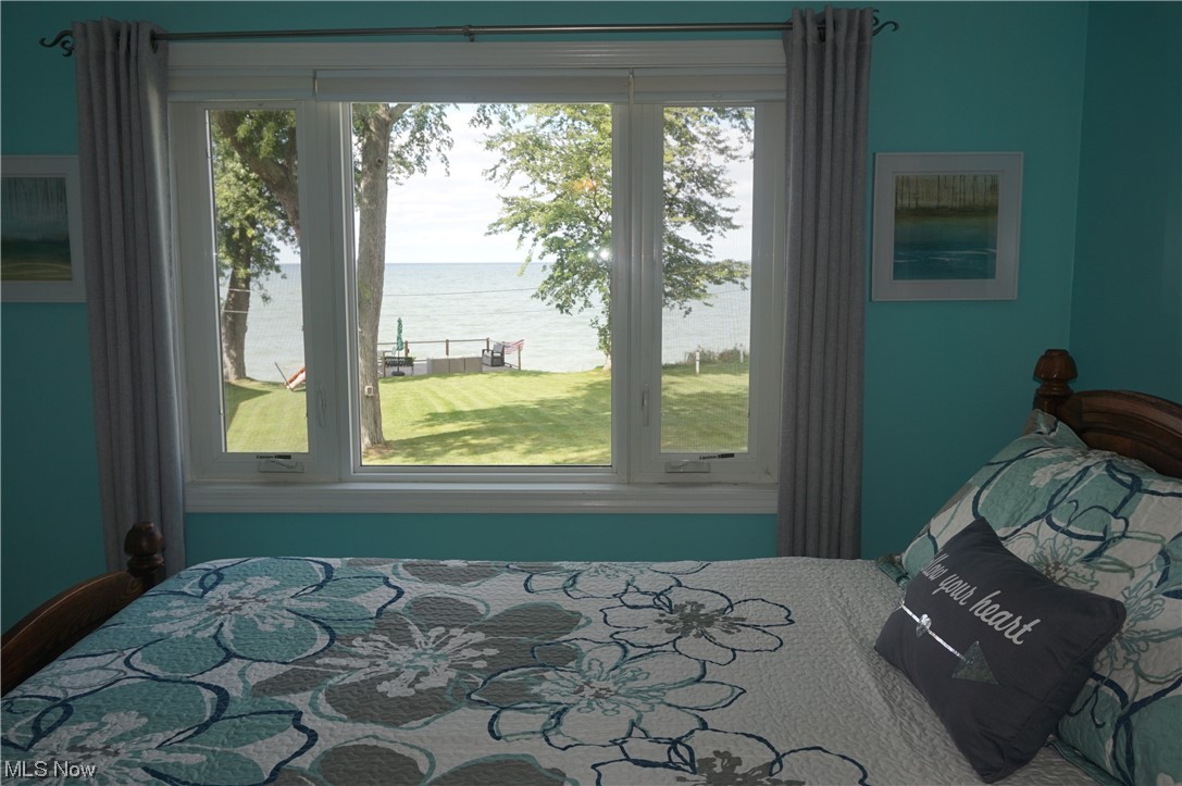 7311 Lake Road East Madison, OH 44057 - Photo 18 of 35 Master bedroom with fabulous view.