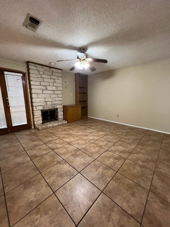 3506 Speedway, Unit 101 Austin, TX 78705 - Photo 12 of 31 a view of an empty room with a fireplace