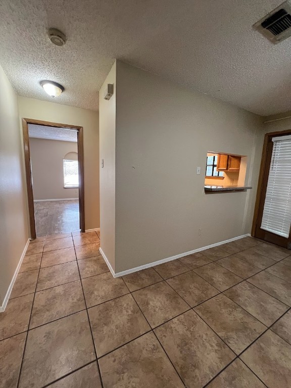 3506 Speedway, Unit 101 Austin, TX 78705 - Photo 17 of 31 a view of a hallway to a livingroom with window